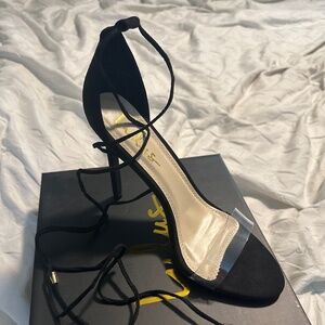 Brand new in Box Lulus Black lace up heels